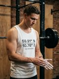 Male hybrid athlete wearing the Nordstoke men's tank top in a gym