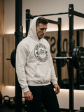Nordstoke Badge Hoodie — full-length gym lifestyle shot