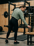 Nordstoke Badge Cropped Sweatshirt — full-length gym lifestyle shot